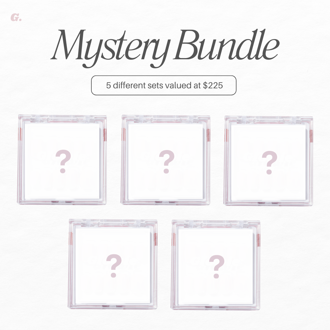 An image for Glowie By Her's "Mystery Bundle 2" promotion features five translucent boxes with question marks. Text reads "5 different sets valued at $225," suggesting surprise items worth over $115 each on a crisp white background.