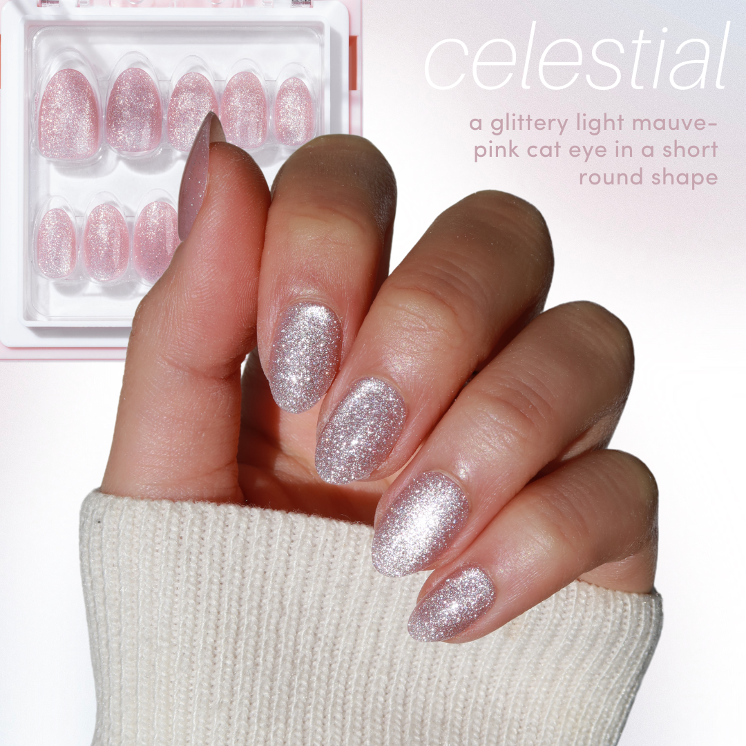 A hand with short, round, glittery light mauve-pink cat eye nails is shown against a white background. Nearby, a package of similar false nails glistens. The text reads: "11:11 - Full Collection by Glowie By Her - Embrace the shimmer during our Black Friday Sale (35% Off).