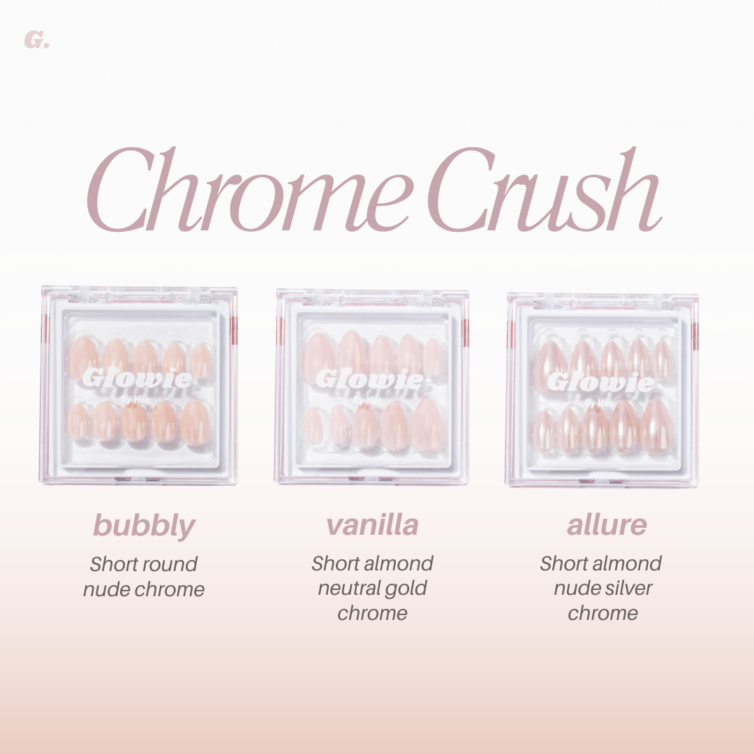 Display featuring three sets of chrome press-on nails from Glowie By Her's Chrome Crush Collection (10% Off). From left: "bubbly" (short round nude chrome), "vanilla" (short almond neutral gold chrome), and "allure" (short almond nude silver chrome), all in reusable Glowie cases.