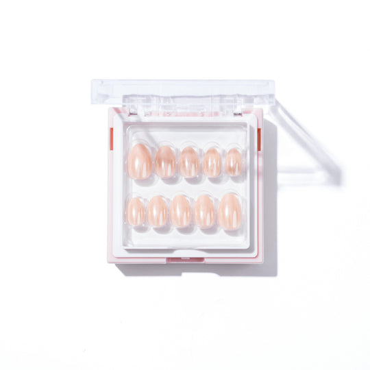 The "Bubbly" set by Glowie By Her is presented in an open, transparent rectangular box on a white background, showcasing salon-quality pink oval nails. Neatly arranged in two rows, these nails add a touch of luxury to your manicure routine.